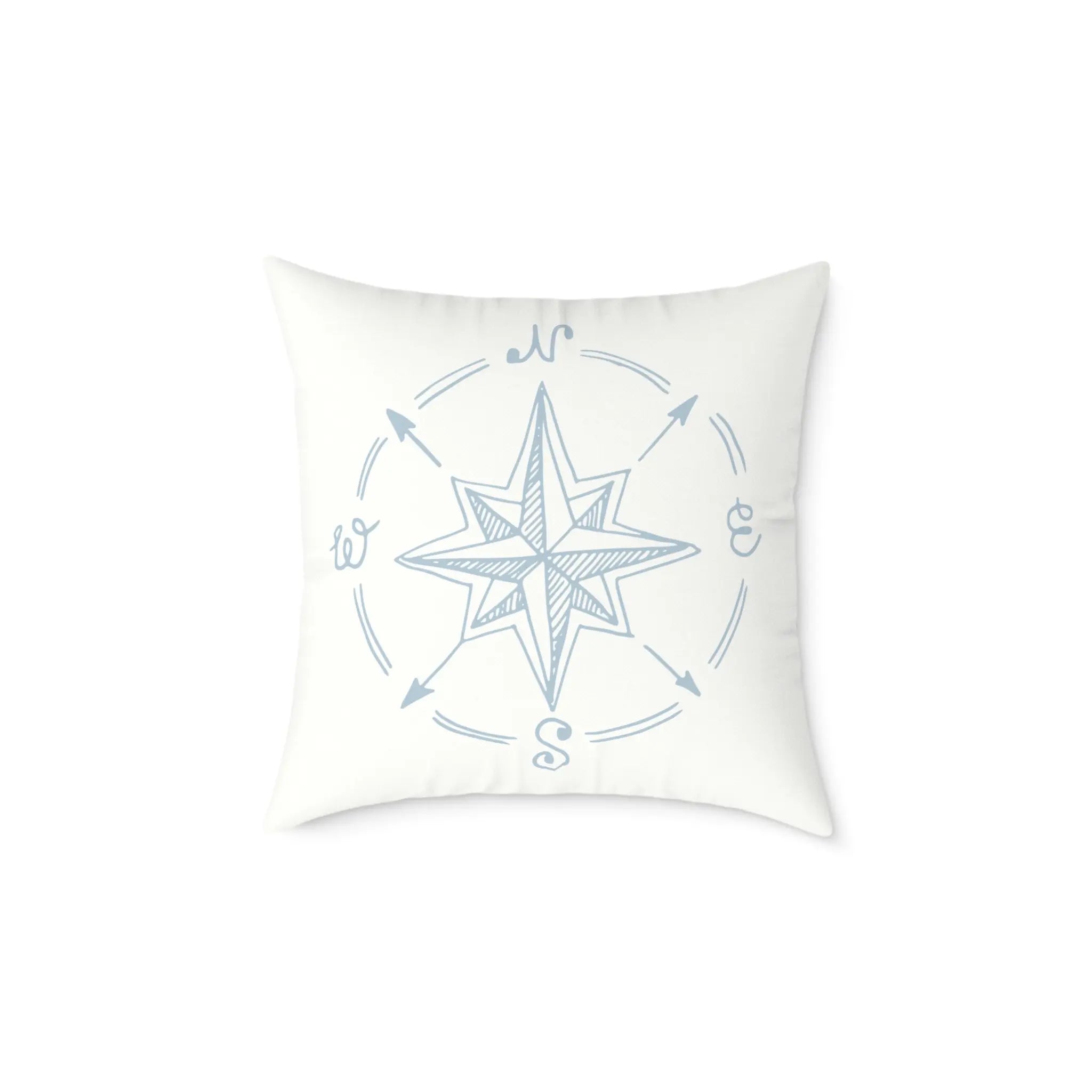 True North Throw Pillow featuring a blue nautical compass rose with N, E, S, W on white fabric.