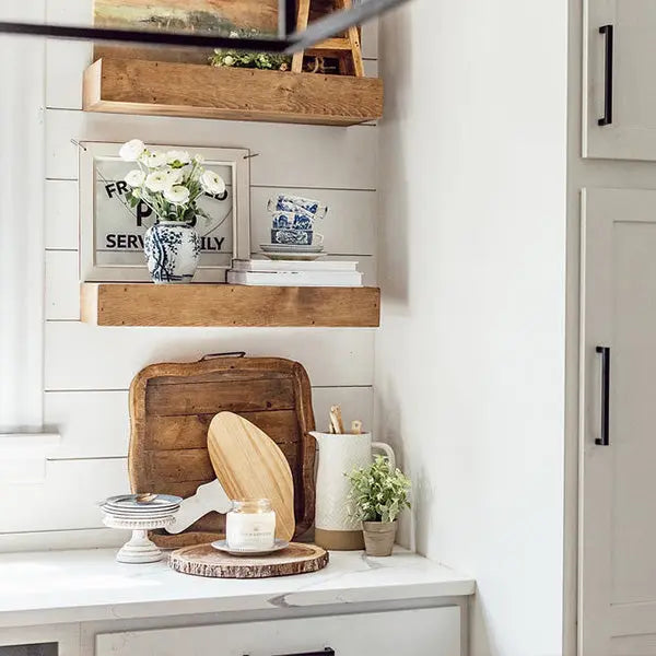 Marble and Wood Mushroom Cutting Board displayed on white kitchen counter with rustic decor.