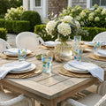 Ocean Creature Texutured Acrylic Glasses, set of 2, sea-life pattern with seahorses on an outdoor dining table.