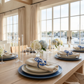 Set of 4 anchor napkin rings holding linen napkins on a nautical coastal dining table