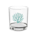 Rim and base detail of teal coral cocktail glass with coastal design.