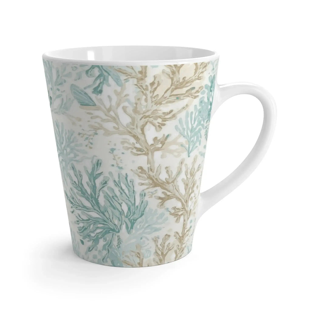 Closeup of aqua coral motif on coastal coffee mug.