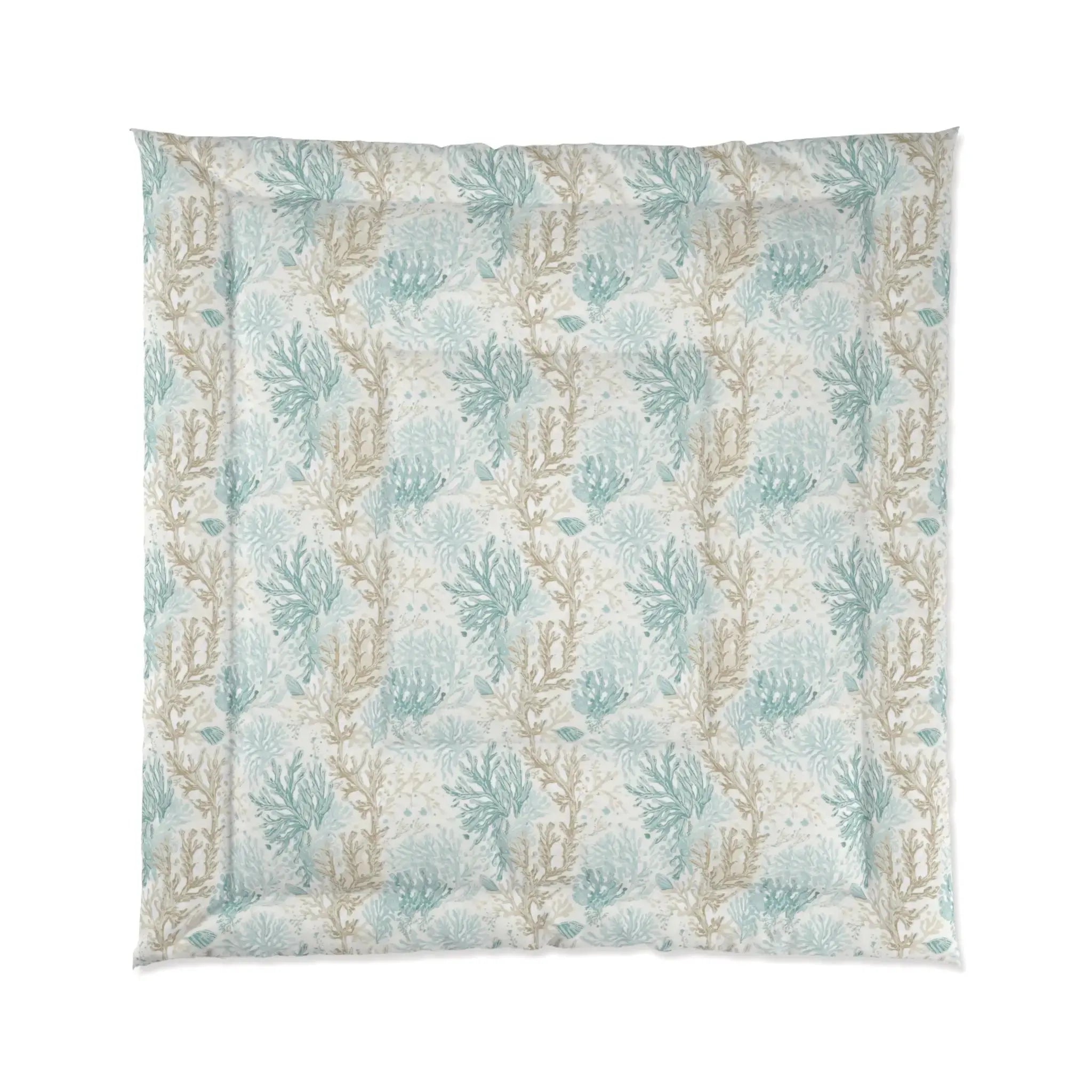 Aqua coral comforter styled with white pillows and natural accents in a coastal bedroom