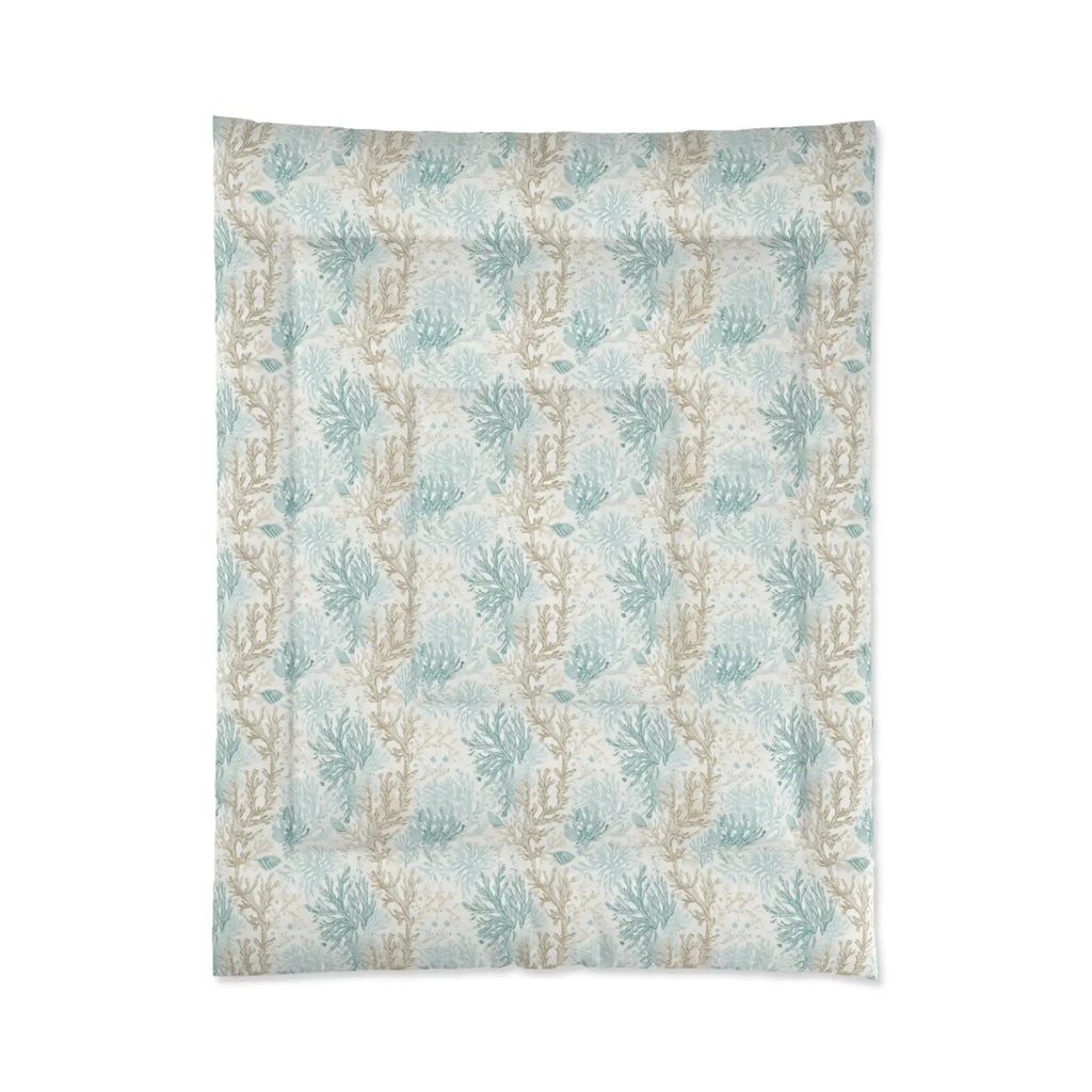 Closeup of aqua coral pattern on soft coastal comforter set.