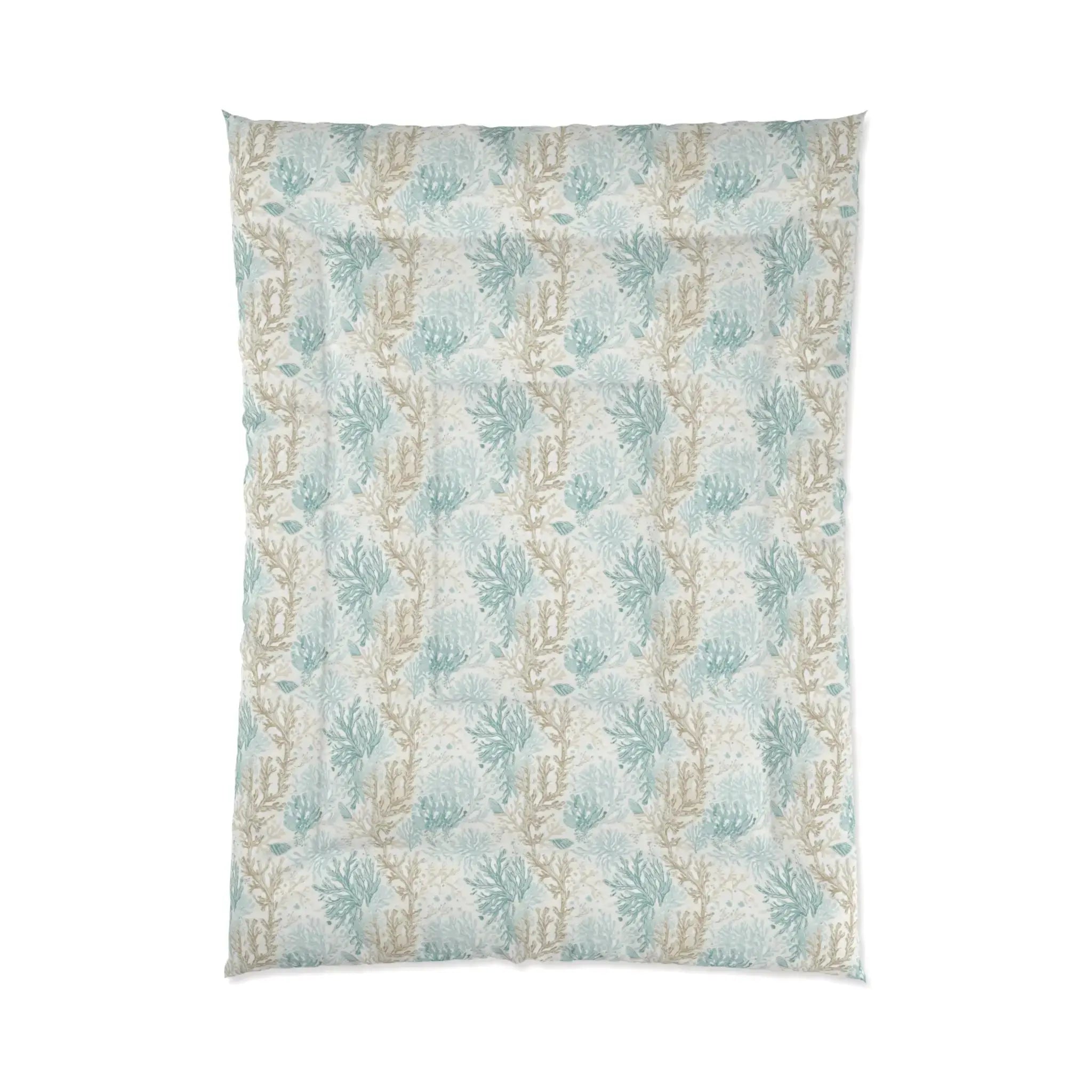 Aqua coral pattern comforter on a queen bed in a relaxed coastal farmhouse bedroom