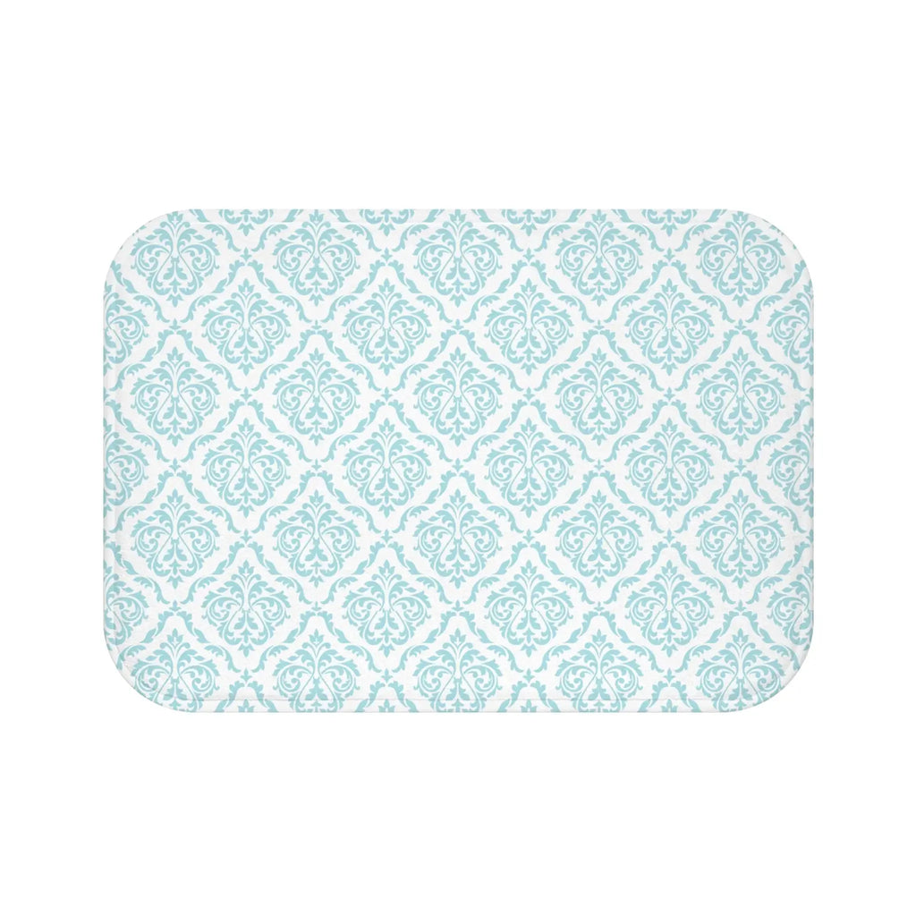 Soft aqua damask bath mat adding color to a coastal bathroom