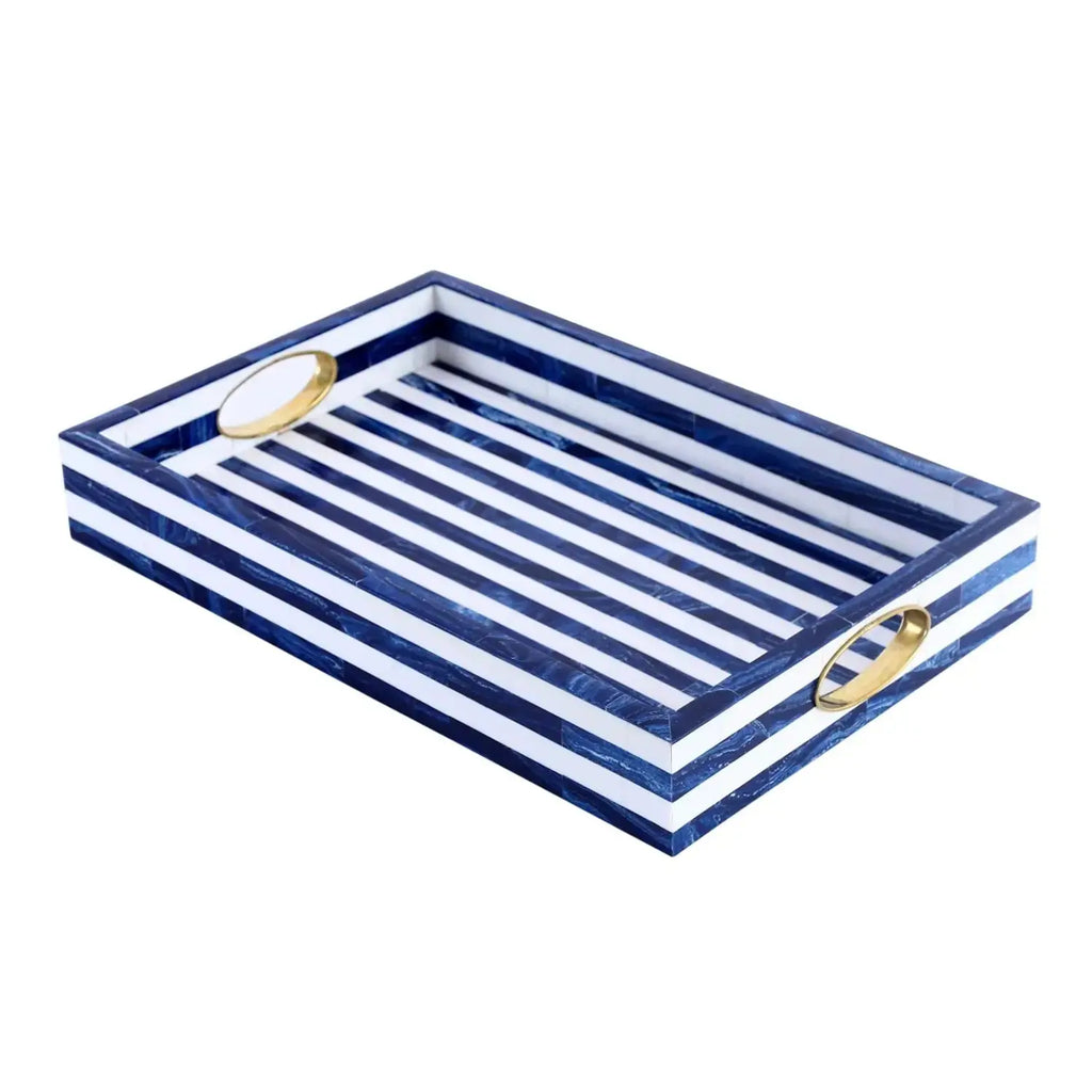 modern decorative tray holding candles and decor accents