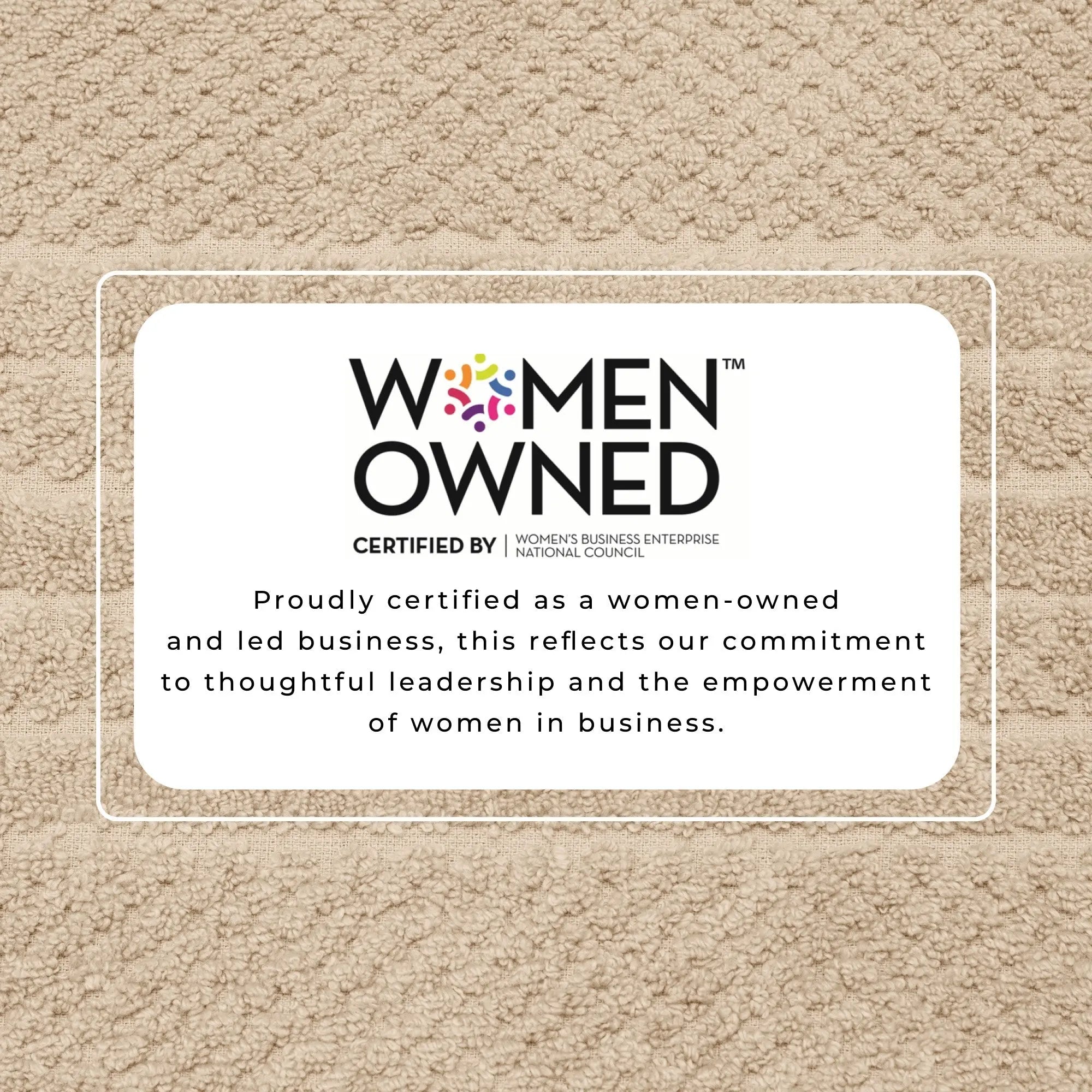 Bath towel set by Great Bay Home on beige cotton towel with Women Owned certification badge.