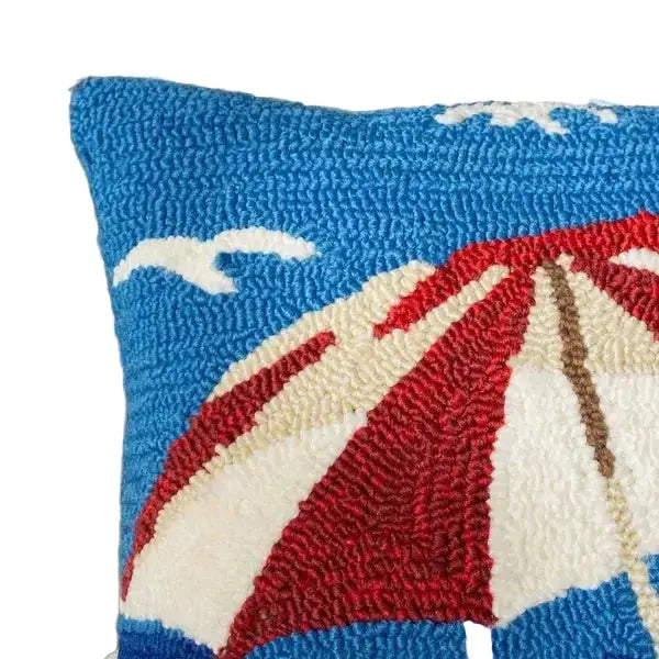 Closeup of beach chair illustration on coastal throw pillow fabric