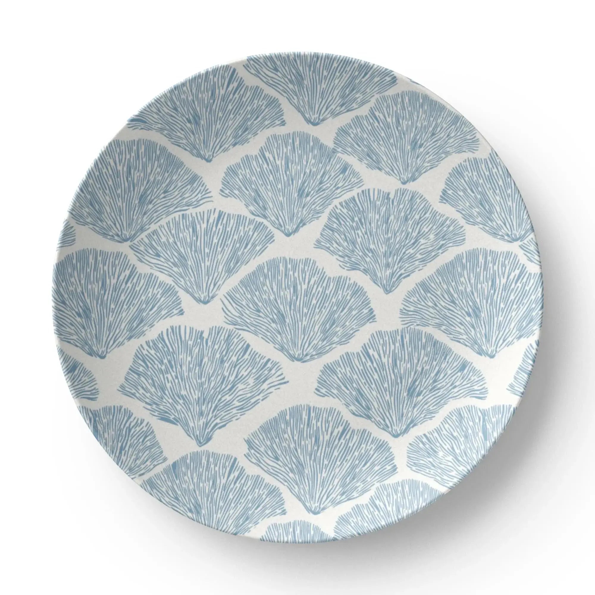Blue coral patterned plates designed for coastal table settings