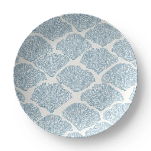 Blue coral patterned plates designed for coastal table settings