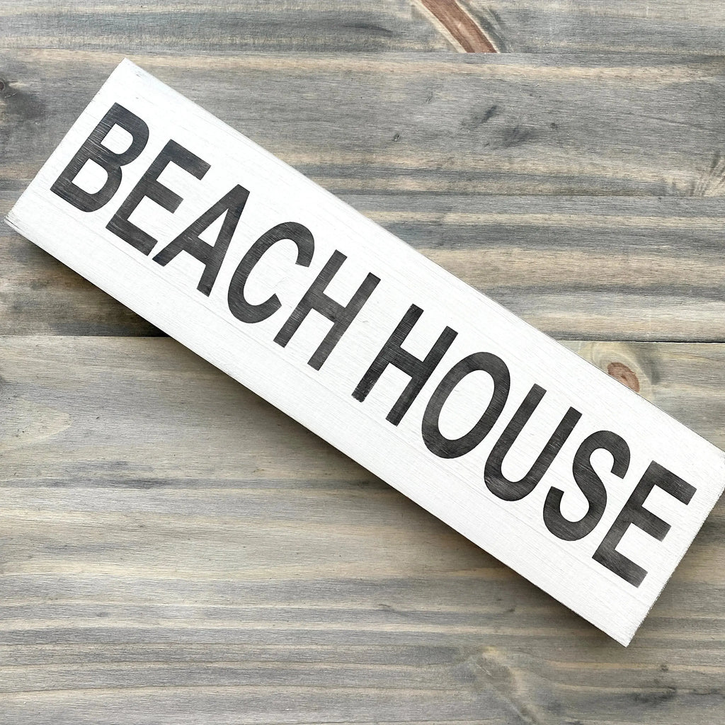 coastal wall sign with white background and custom lettering