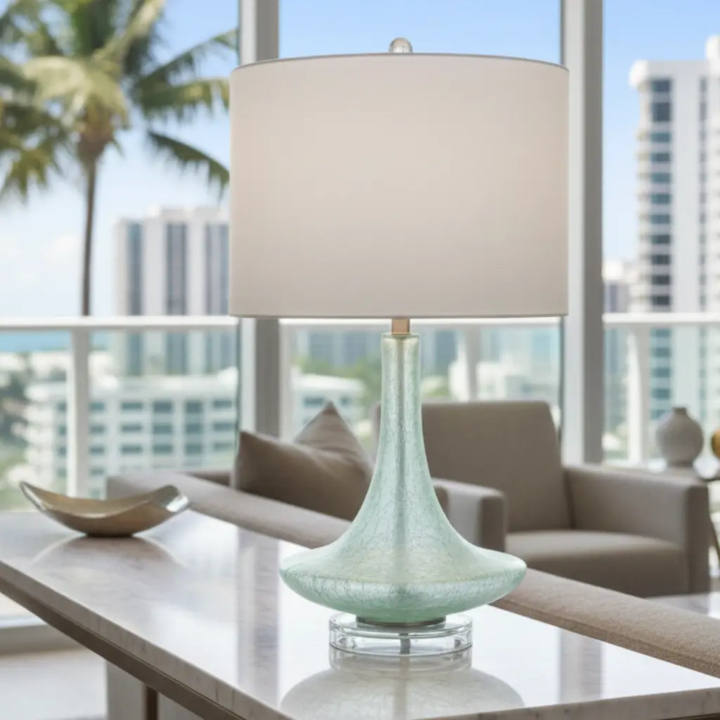 Decorative teal coastal lamp on a side table 