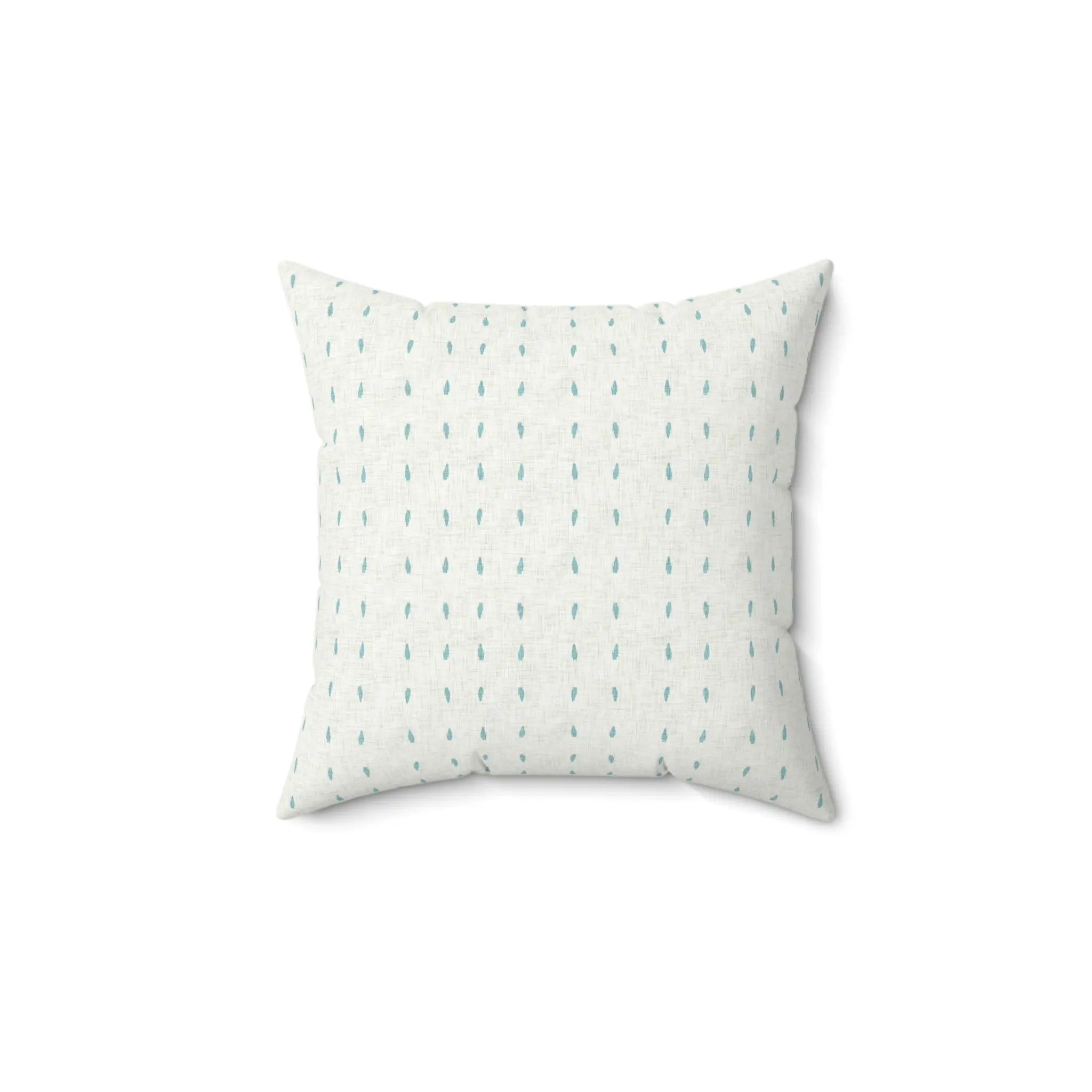 Capri Polka Dot Throw Pillow in white fabric with turquoise dots.