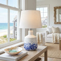 Elegant ceramic lamp with hand-painted blue and white abstract design