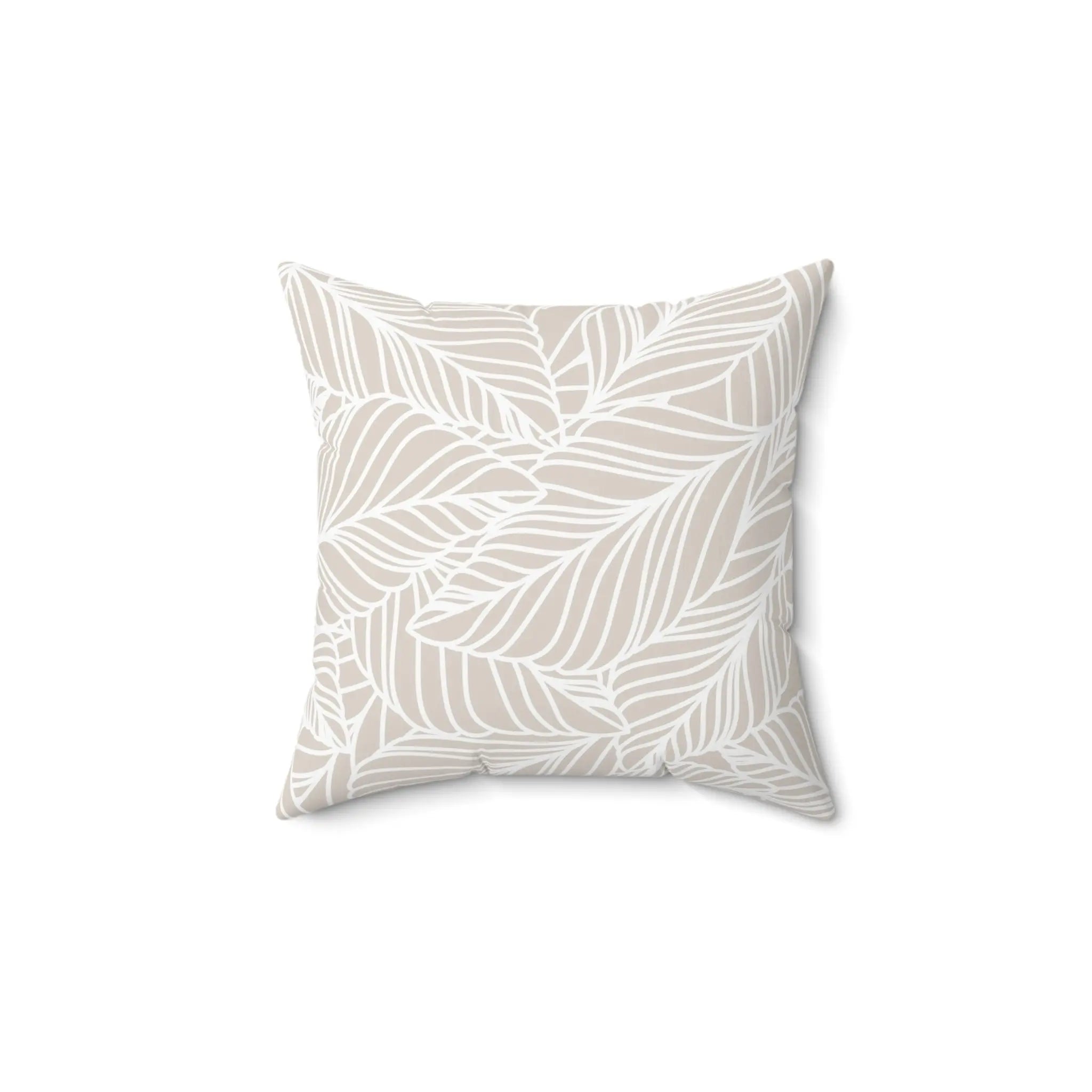 Beige leaf-pattern throw pillow with white leaf outlines on a sand-toned background.