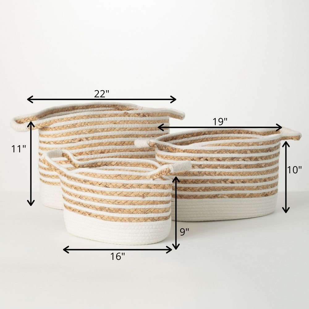 Set of three beige and ivory-white striped woven rope storage baskets with integrated handles in graduated sizes.