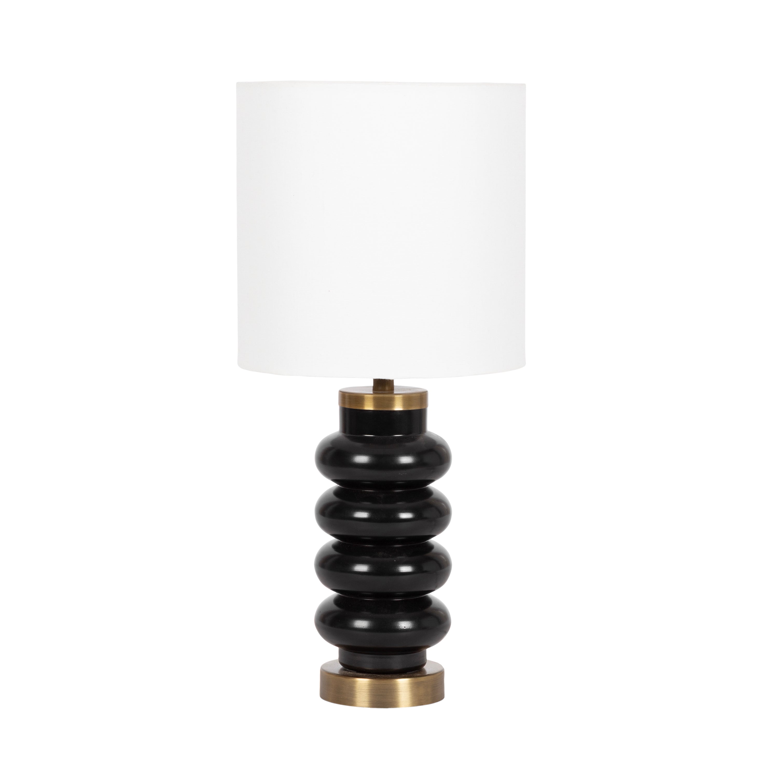 Glossy black ceramic table lamp with a stacked rounded base, brass accents, and a white drum shade.