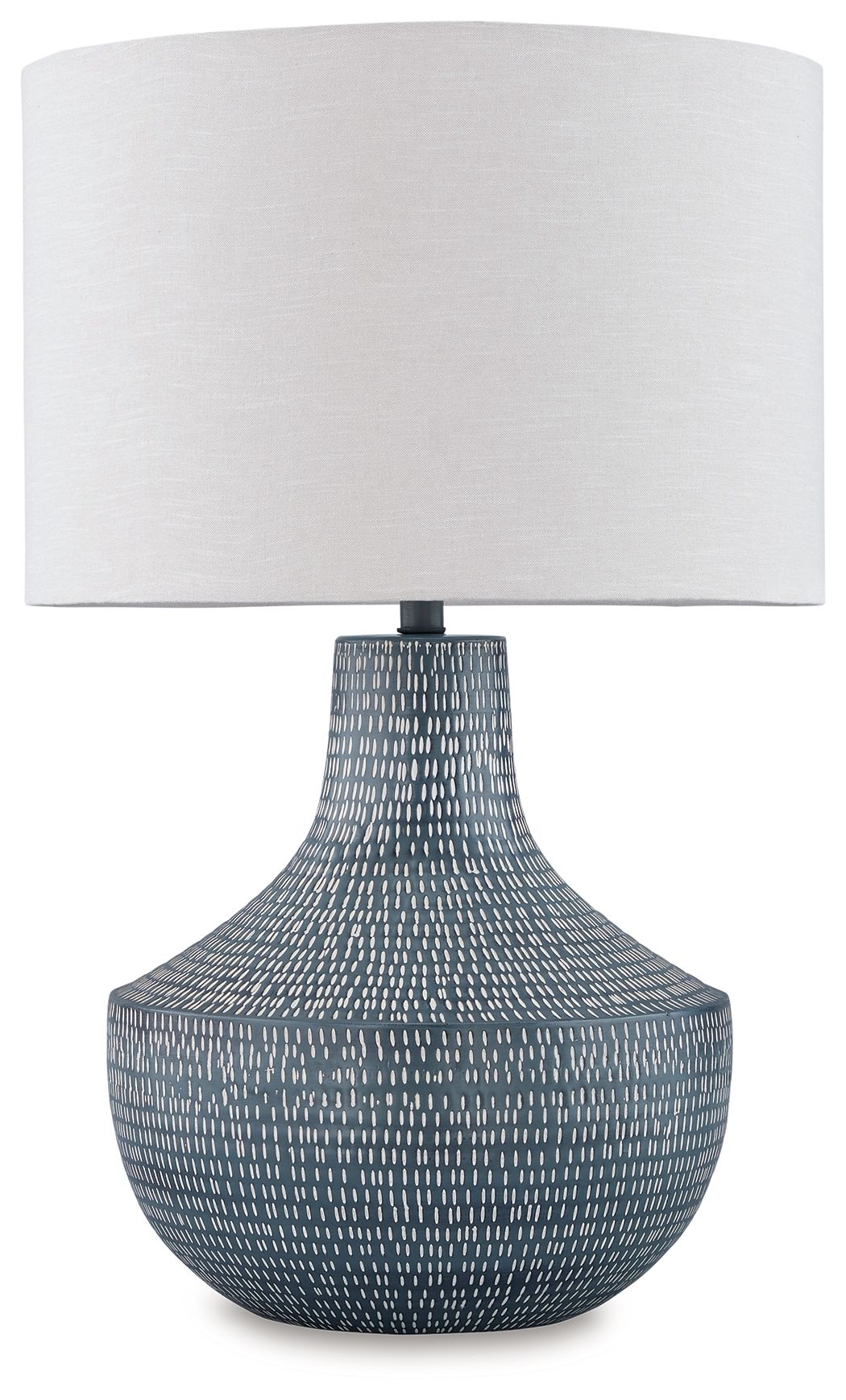 Modern ceramic accent lamp with a dark textured base, adding contrast to a neutral coastal living room.
