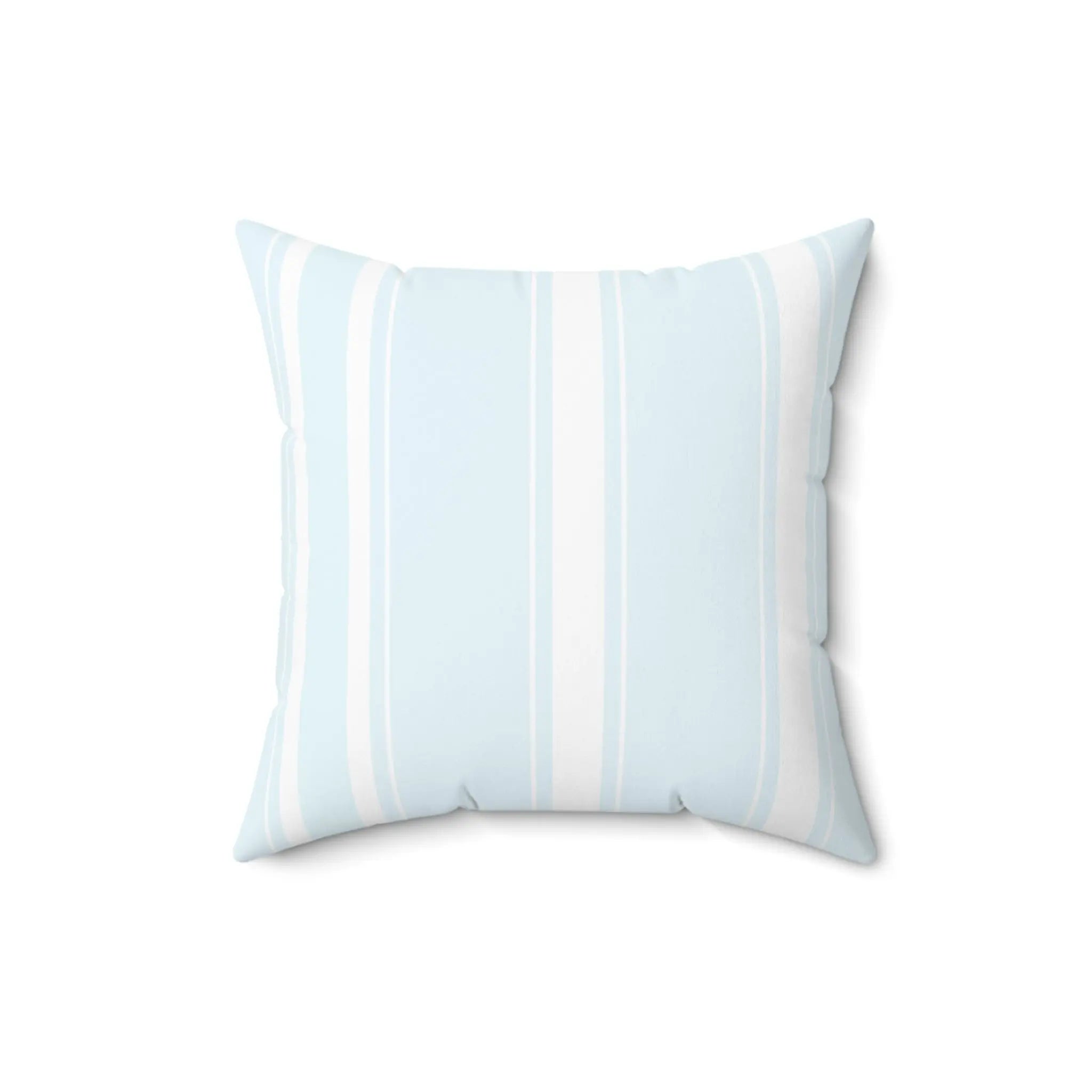 Light blue stripe throw pillow styled for beach house living room with natural accents
