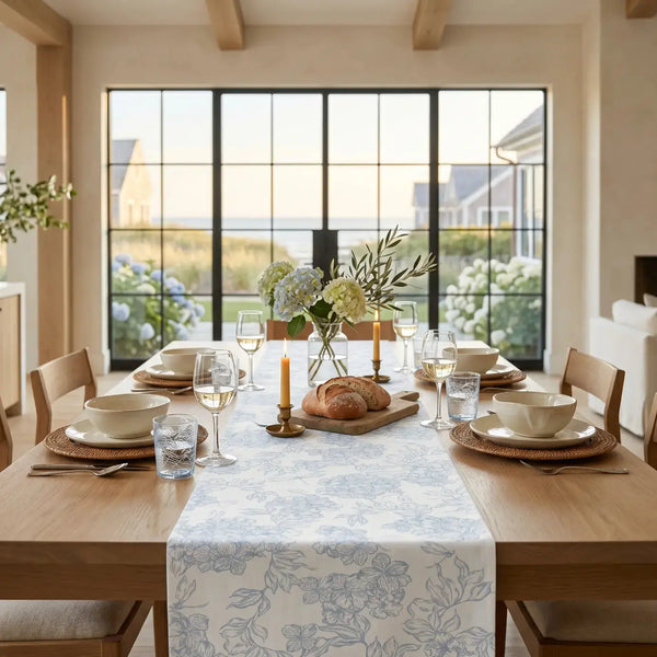 Blue and white floral table runner on a dining table for coastal-inspired decor