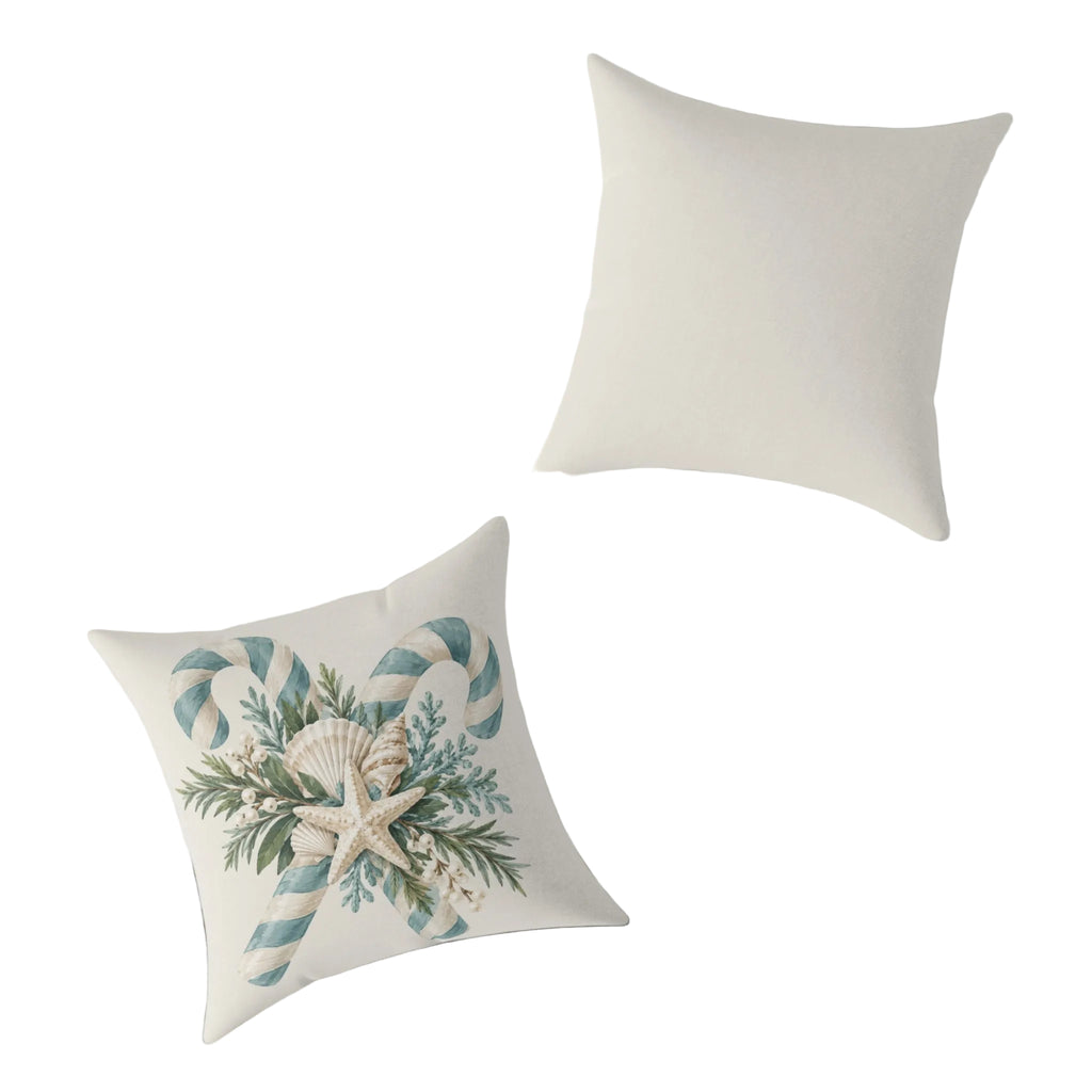 Soft blue and ivory candy cane Christmas pillow with a starfish, scallop shell, and pearl berries, ideal for coastal holiday decor