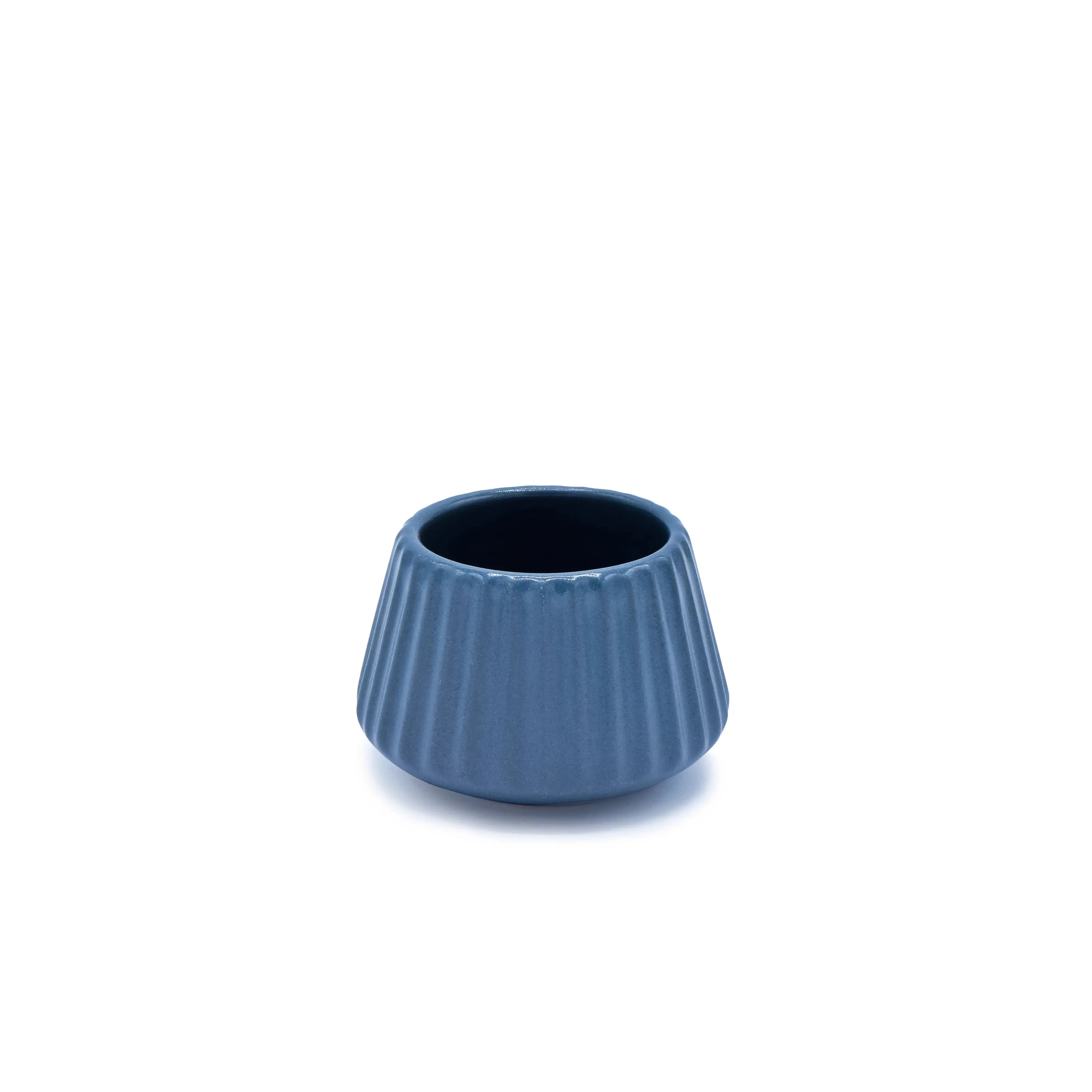 Blue nautical cocktail glass designed for coastal home bars