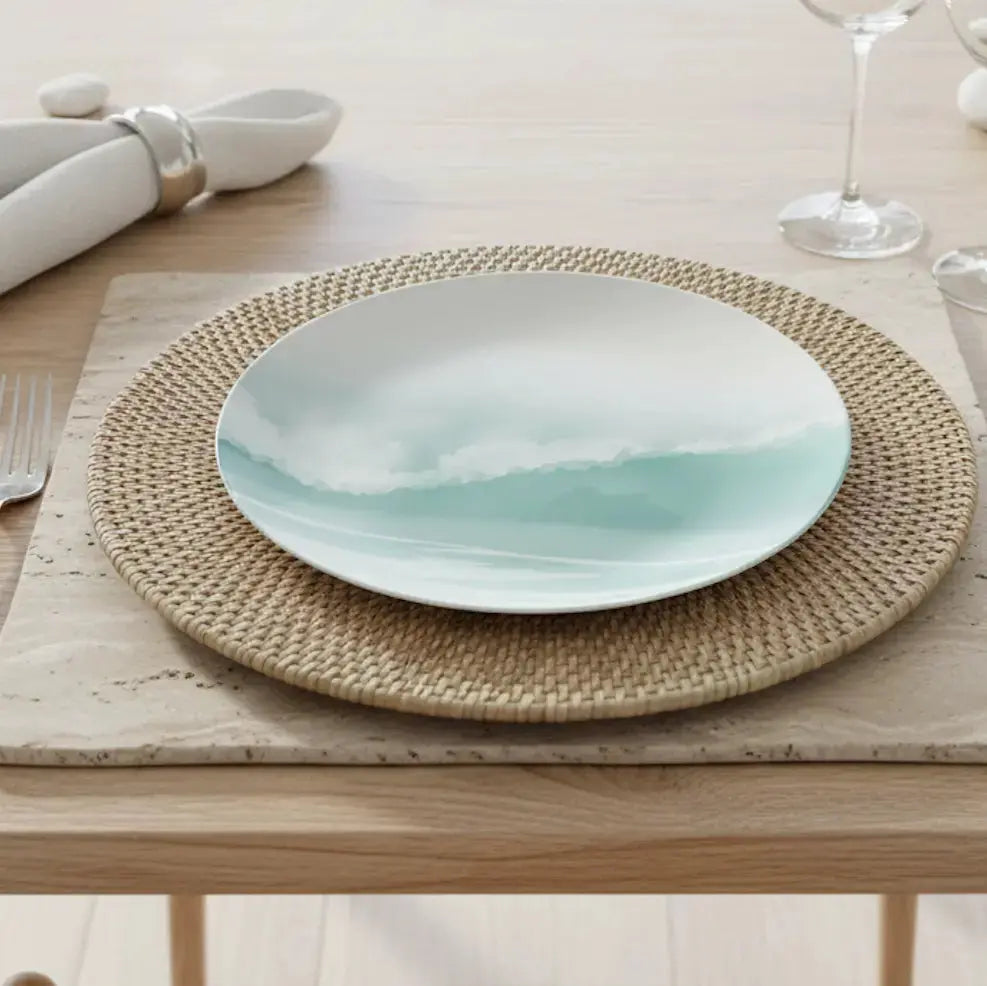 Coastal wave ceramic dinner plate styled on a beach-inspired table