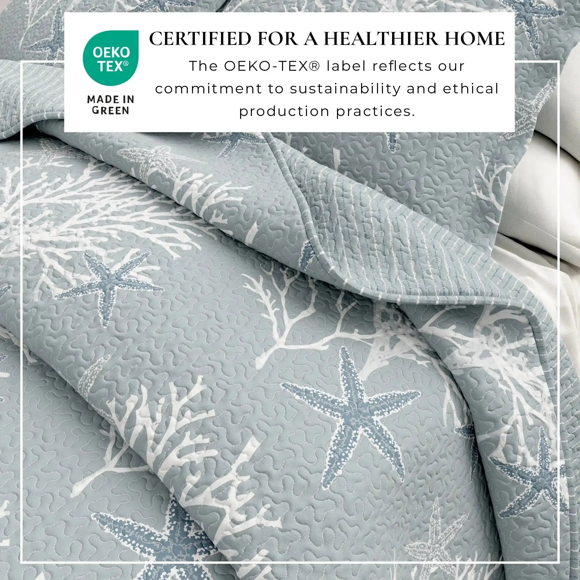 Blue coral pattern quilt set styled in a bright seaside bedroom with simple decor.
