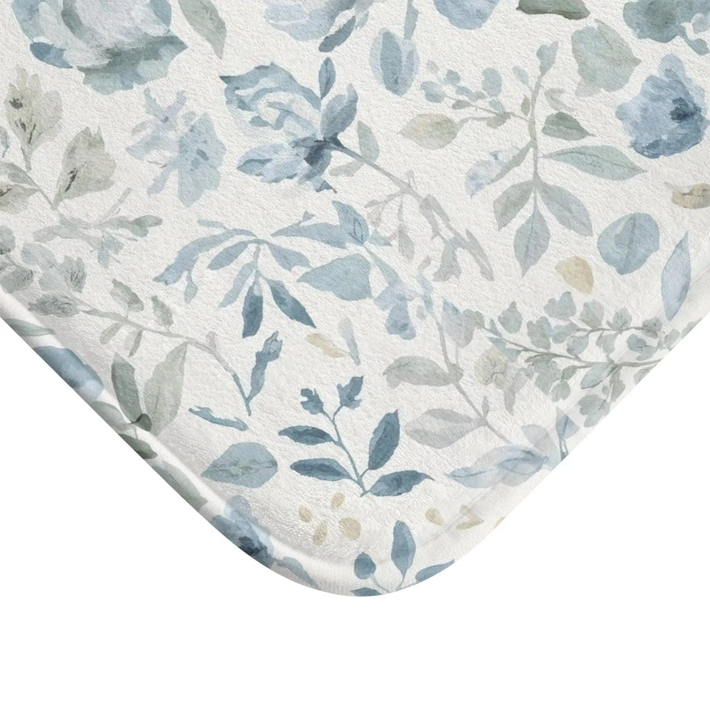Blue floral bath mat for a coastal-style bathroom