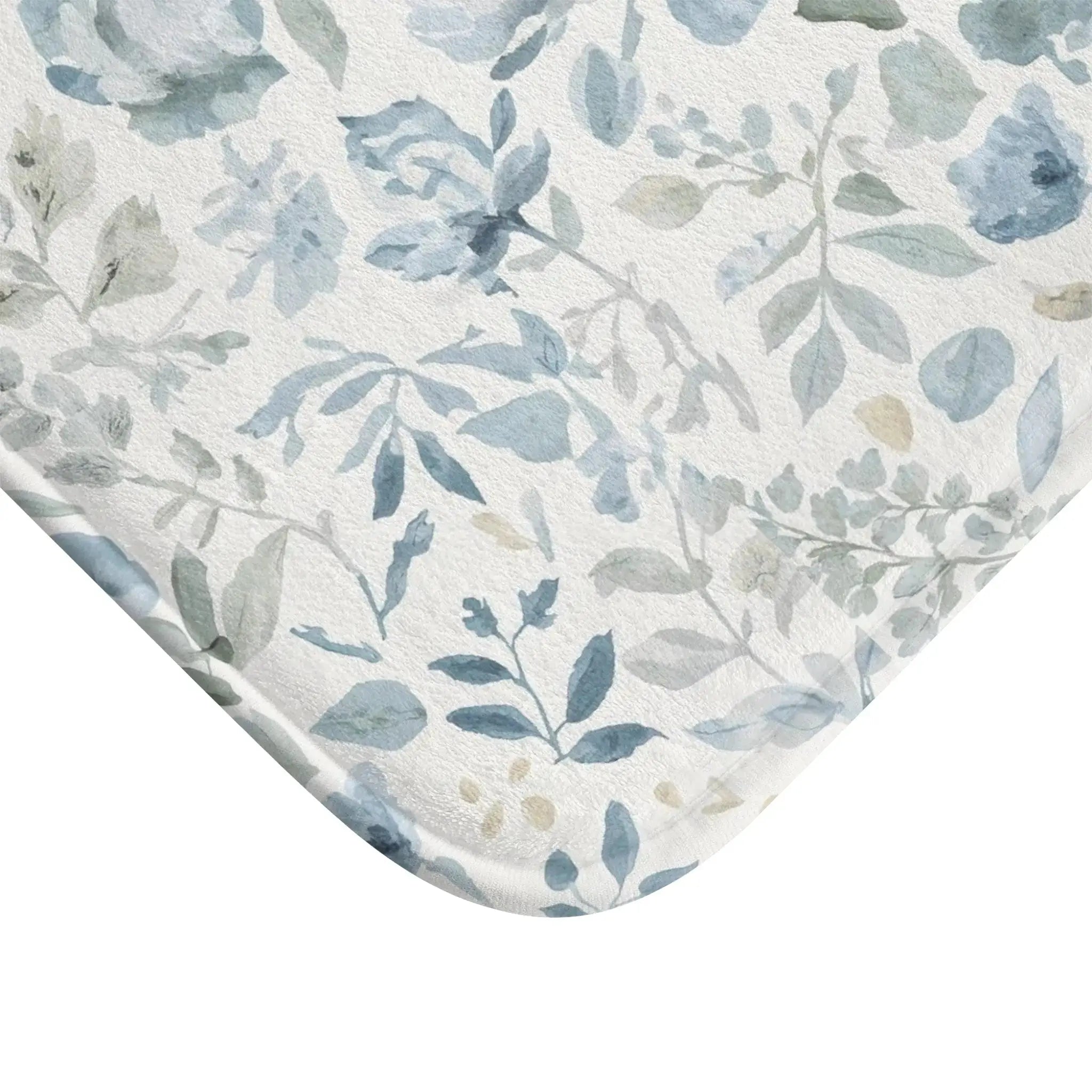 Blue floral bath mat for a coastal-style bathroom