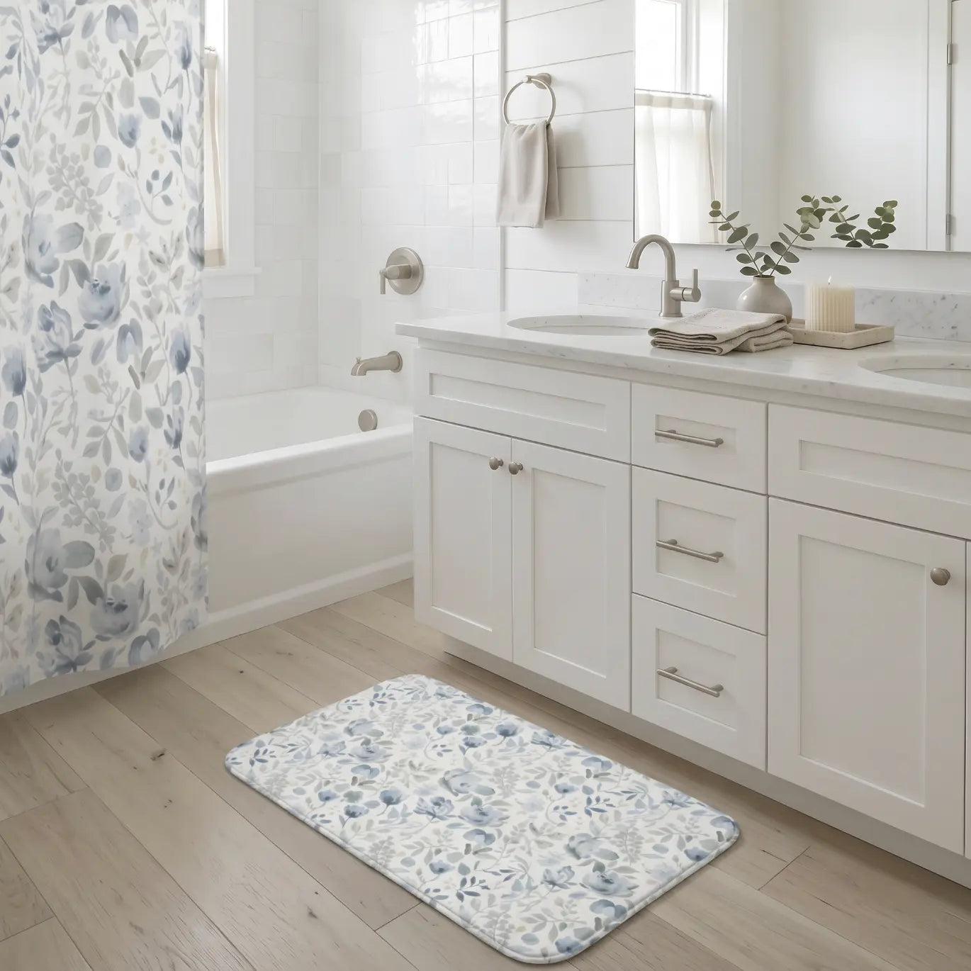 Blue floral bath mat, soft rectangular bathroom rug with flower pattern.