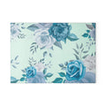 Blue Floral Glass Cutting Board featuring teal blue and white roses on a pale mint background.