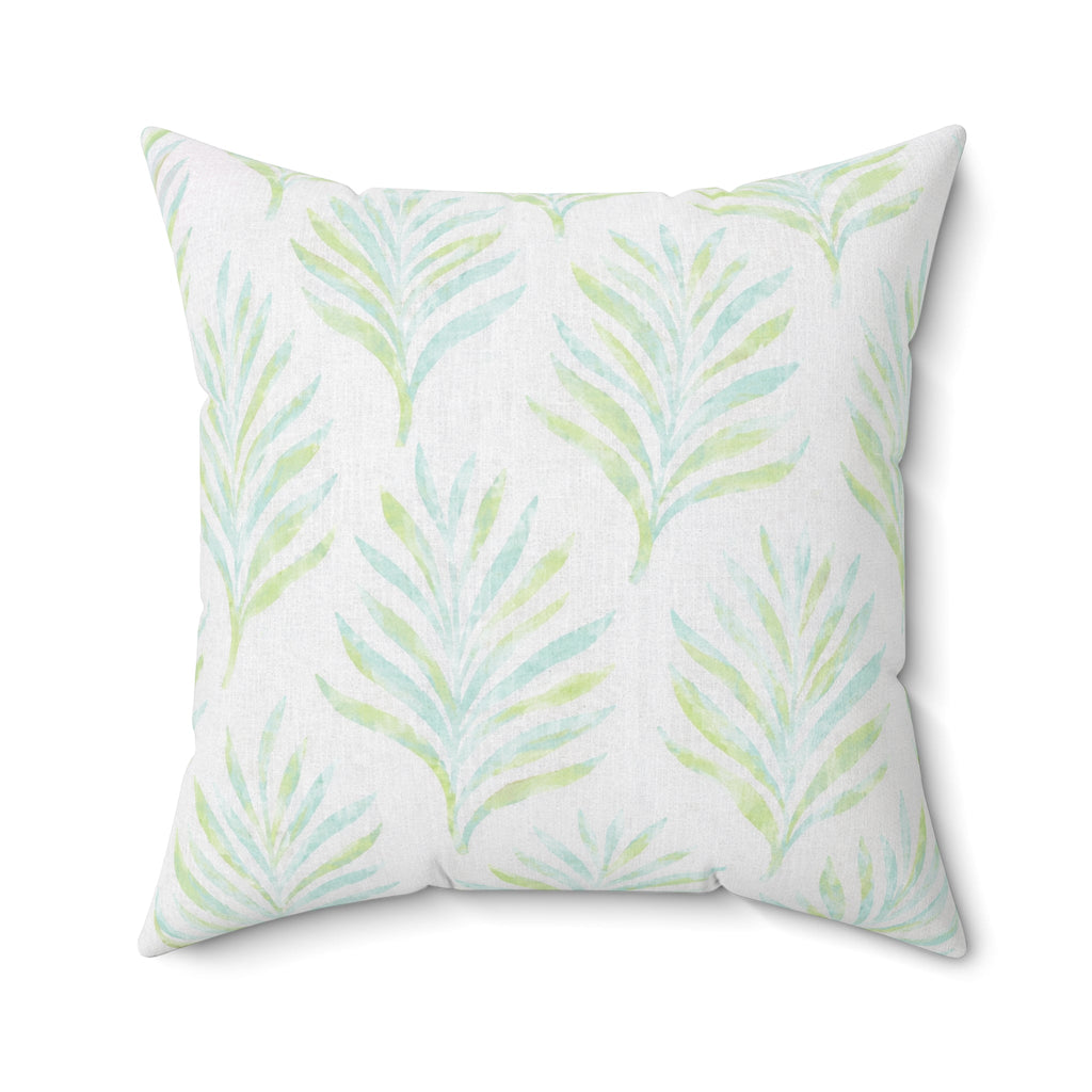 Blue and green leaf pattern throw pillow for a beach house