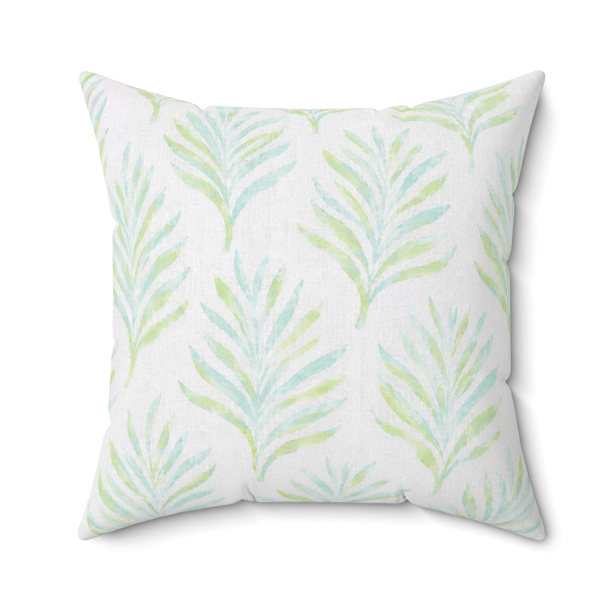 Blue and green leaf pattern throw pillow for a beach house