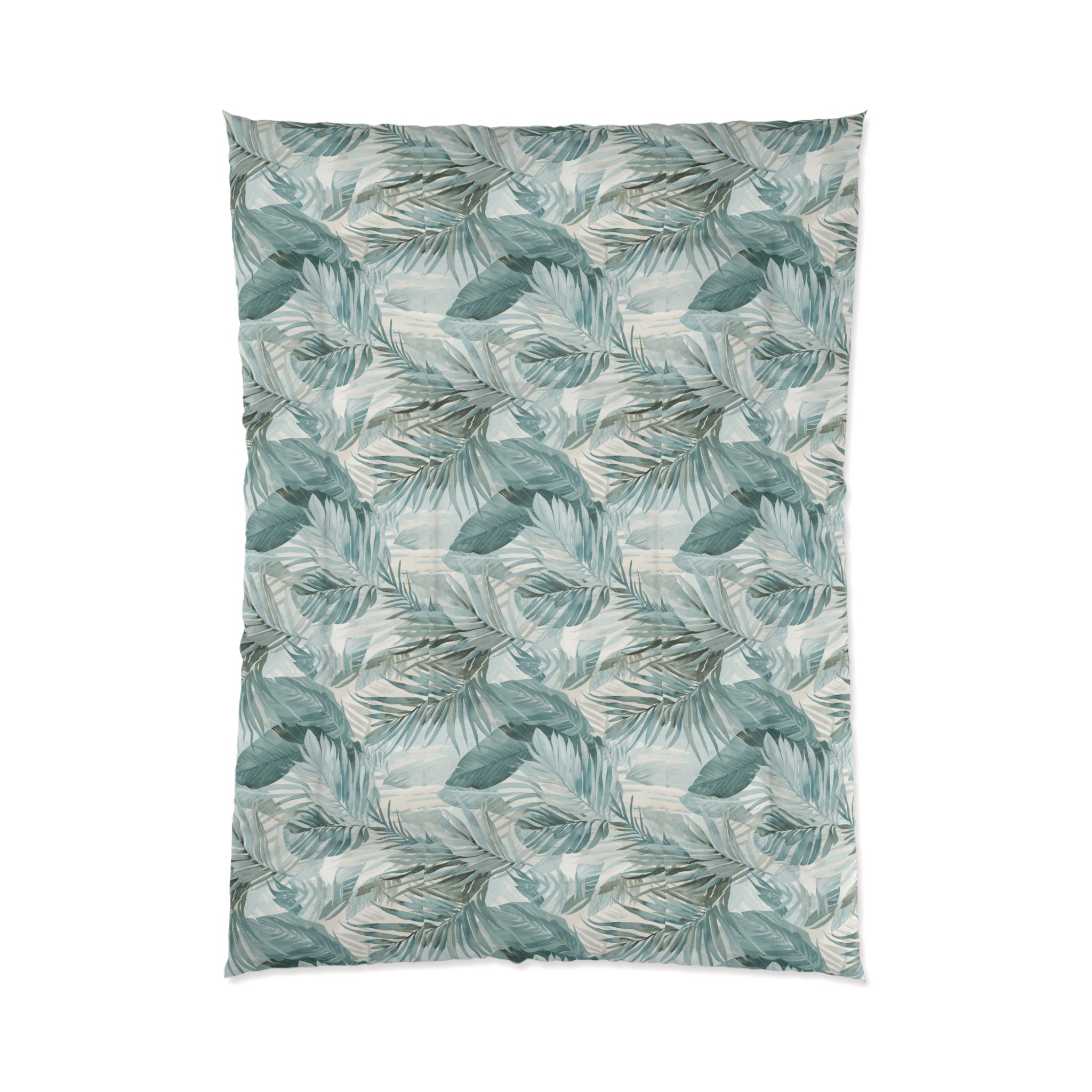 blue green tropical palm comforter creating a coastal look in the bedroom
