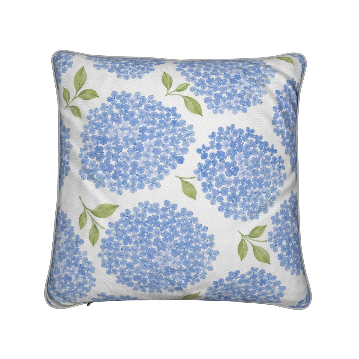 Blue hydrangea guest room pillow with a timeless botanical pattern in blue, green, and ivory