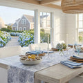 Blue paisley pattern table runner styled in a relaxed beach house tablescape