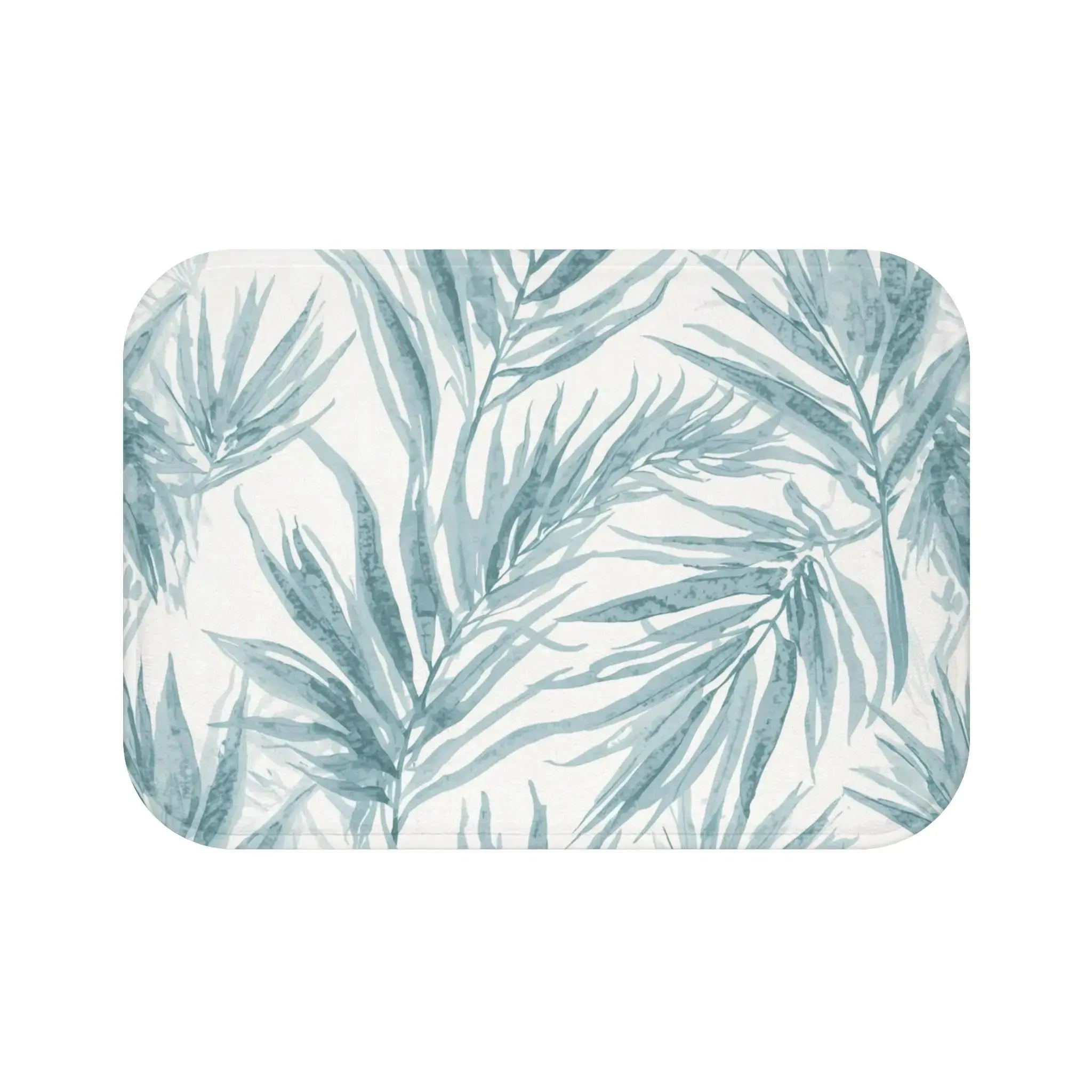Blue palm bath mat for a light, airy bathroom.
