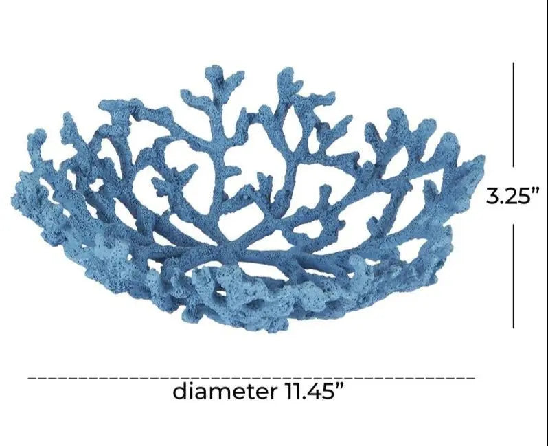 Decorative blue coral resin bowl used as a coastal table centerpiece