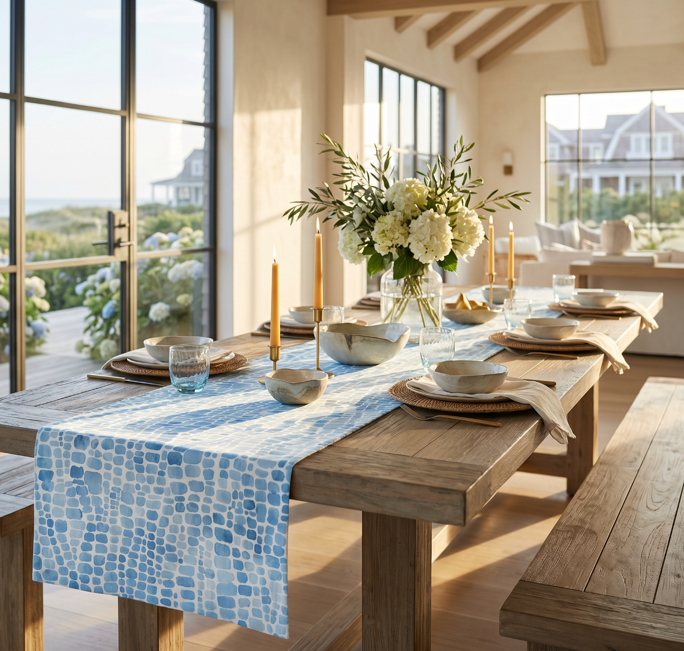 Blue seaglass pattern table runner on a natural wood dining table in a coastal dining room