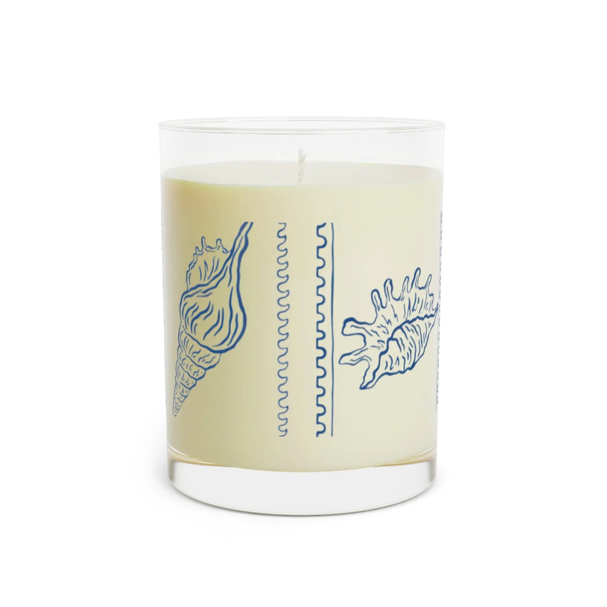 Seashell Reverie Ocean Mist Candle in a clear glass jar with blue seashell illustrations