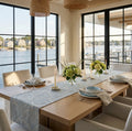 Blue seashell table runner on a coastal dining table in a beach house
