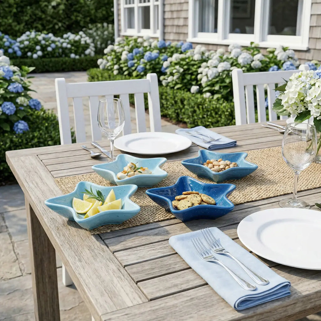 Starfish appetizer dishes set of 4 in varying blues melamine on outdoor dining table.