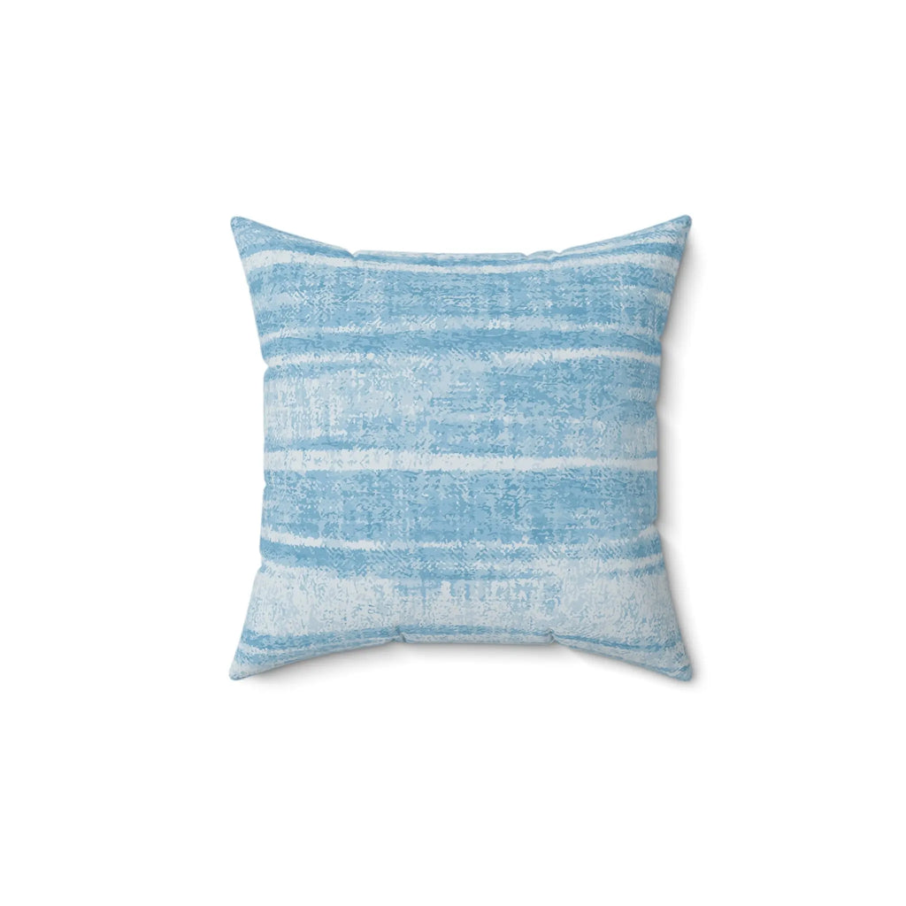 Closeup of blue washed striped throw pillow showing soft washed stripe texture