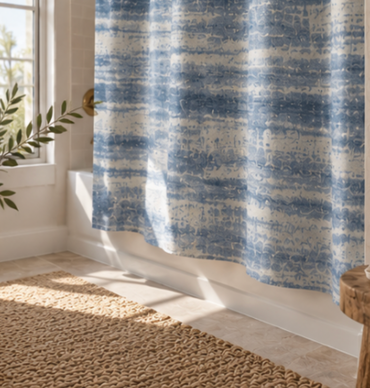 Blue striped shower curtain for classic New England coastal bathroom decor