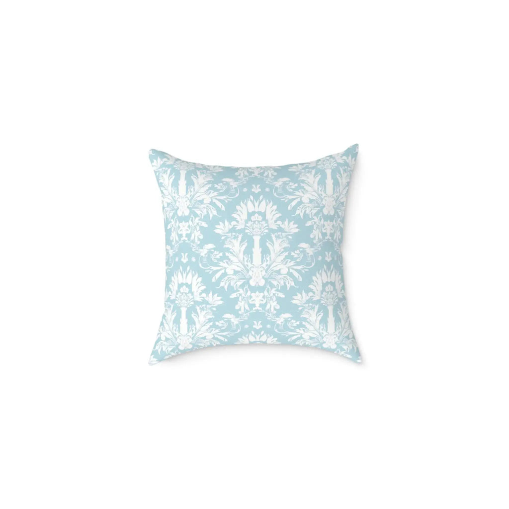 vintage damask accent pillow layered with textured throws