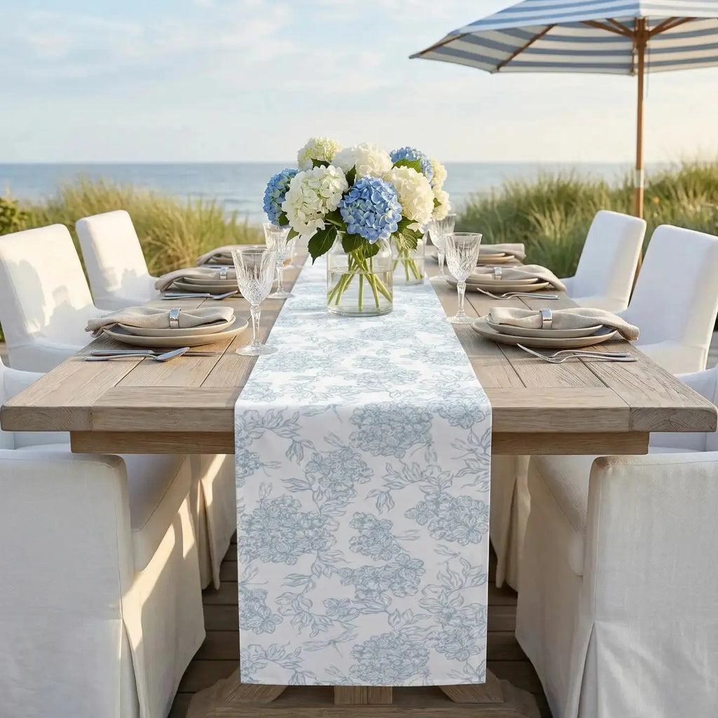 Closeup of blue and white floral pattern on cotton table runner
