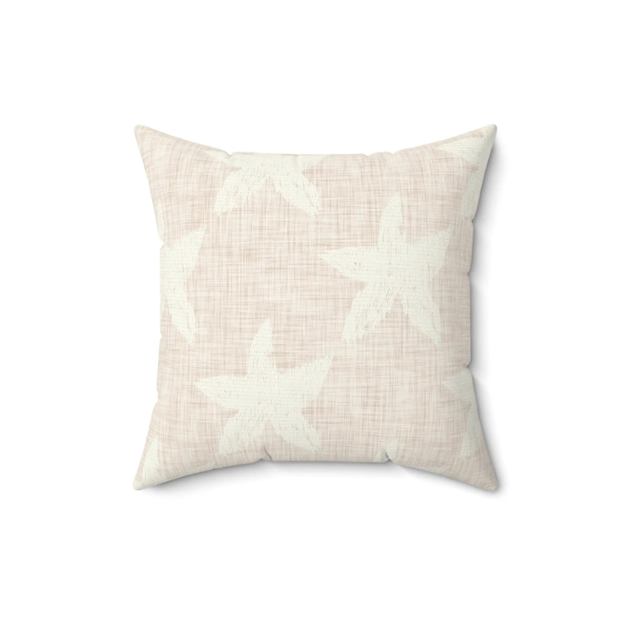 Closeup of blush starfish pattern throw pillow showing starfish design detail