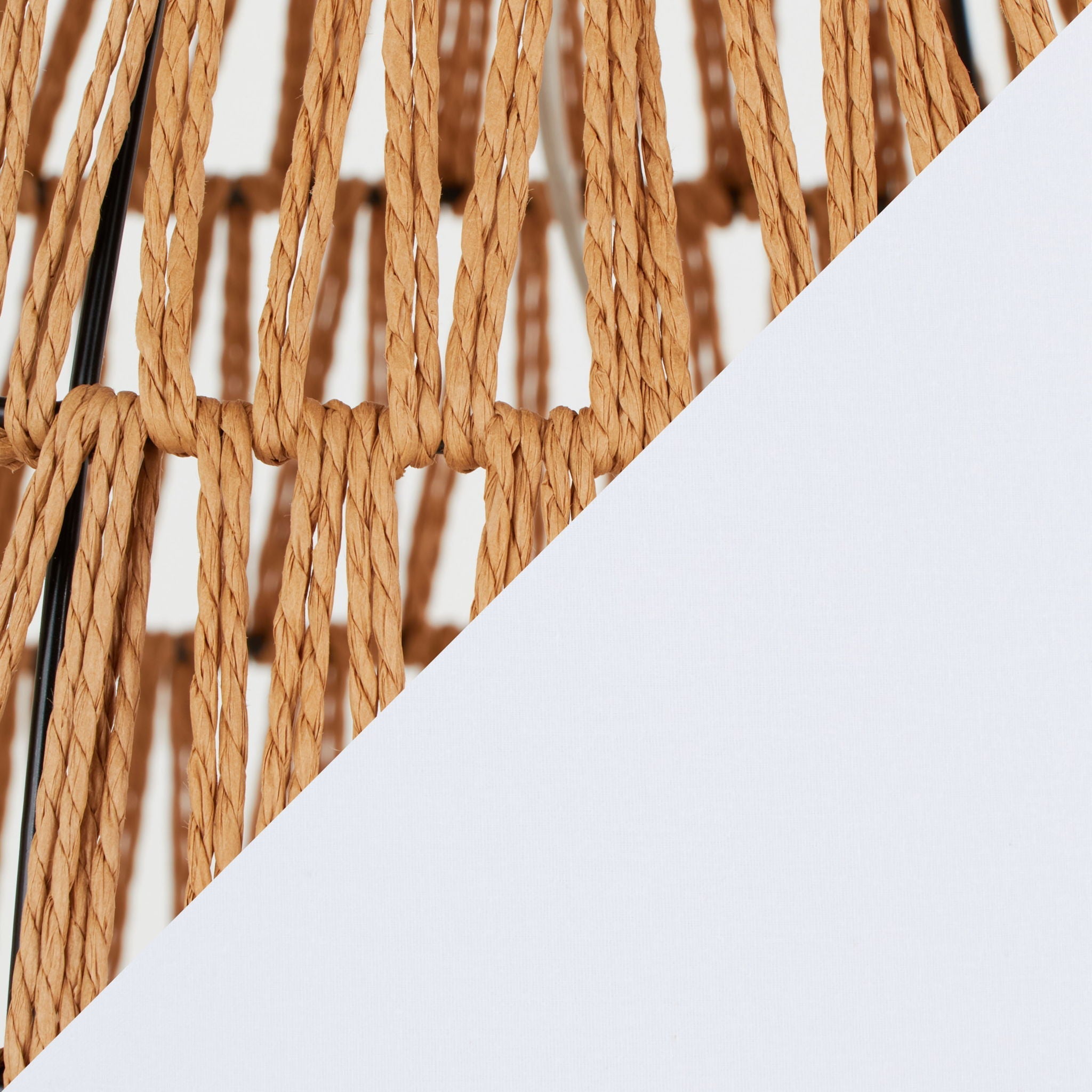 Handwoven rattan lamp with a textured finish for neutral coastal interiors.